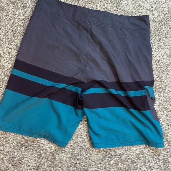 ❤️Ocean Current Teal and Black Board Shorts - Picture 2 of 3